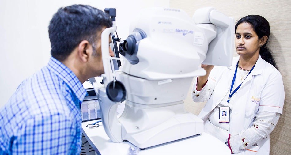 Optometrist recording a patient spectacle power