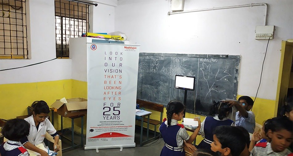 Doctor examining an elderly patient at an outreach camp